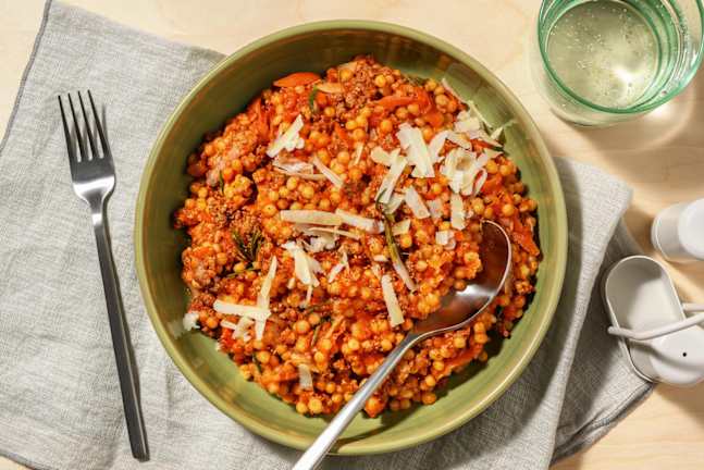 Couscous perlato al ragù di carne e Grana Padano