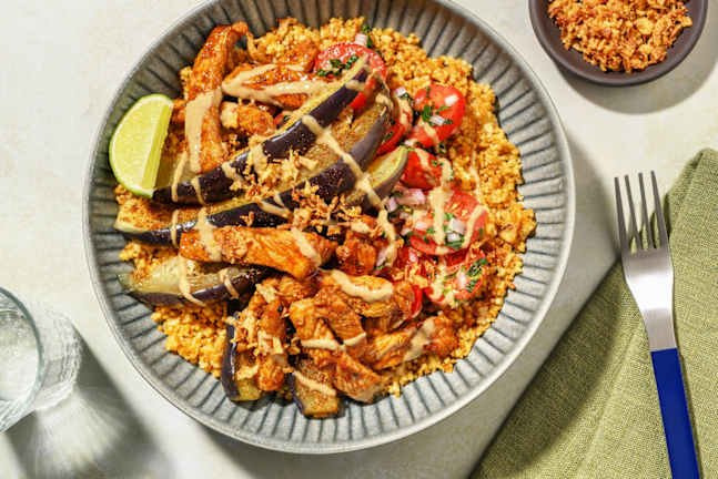 Bowl de semoule complète au porc & aubergine, sauce au tahini