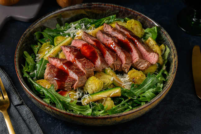 Steak met Parmigiano Reggiano en rucola