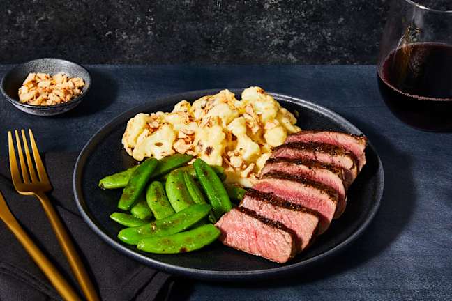 Pan-Seared Steaks with Cheesy Cauliflower