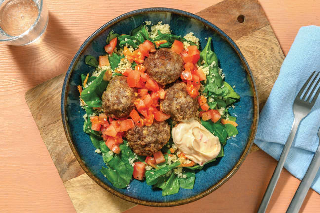 Jerk-Spiced Beef Rissoles with Carrot-Spinach Couscous & Zingy Tomatoes