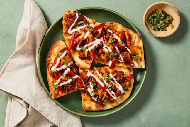Pains plats au poulet style fajitas