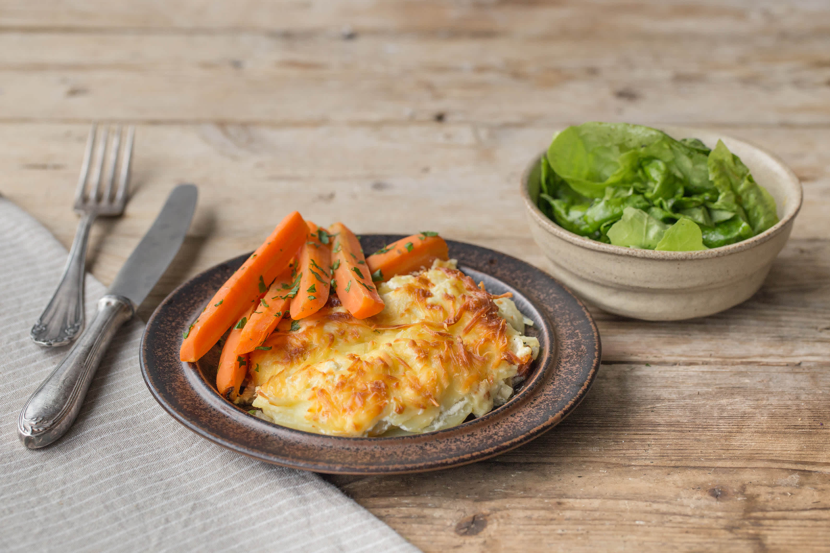 Cremiges Kartoffelgratin mit karamellisierten Zwiebeln,