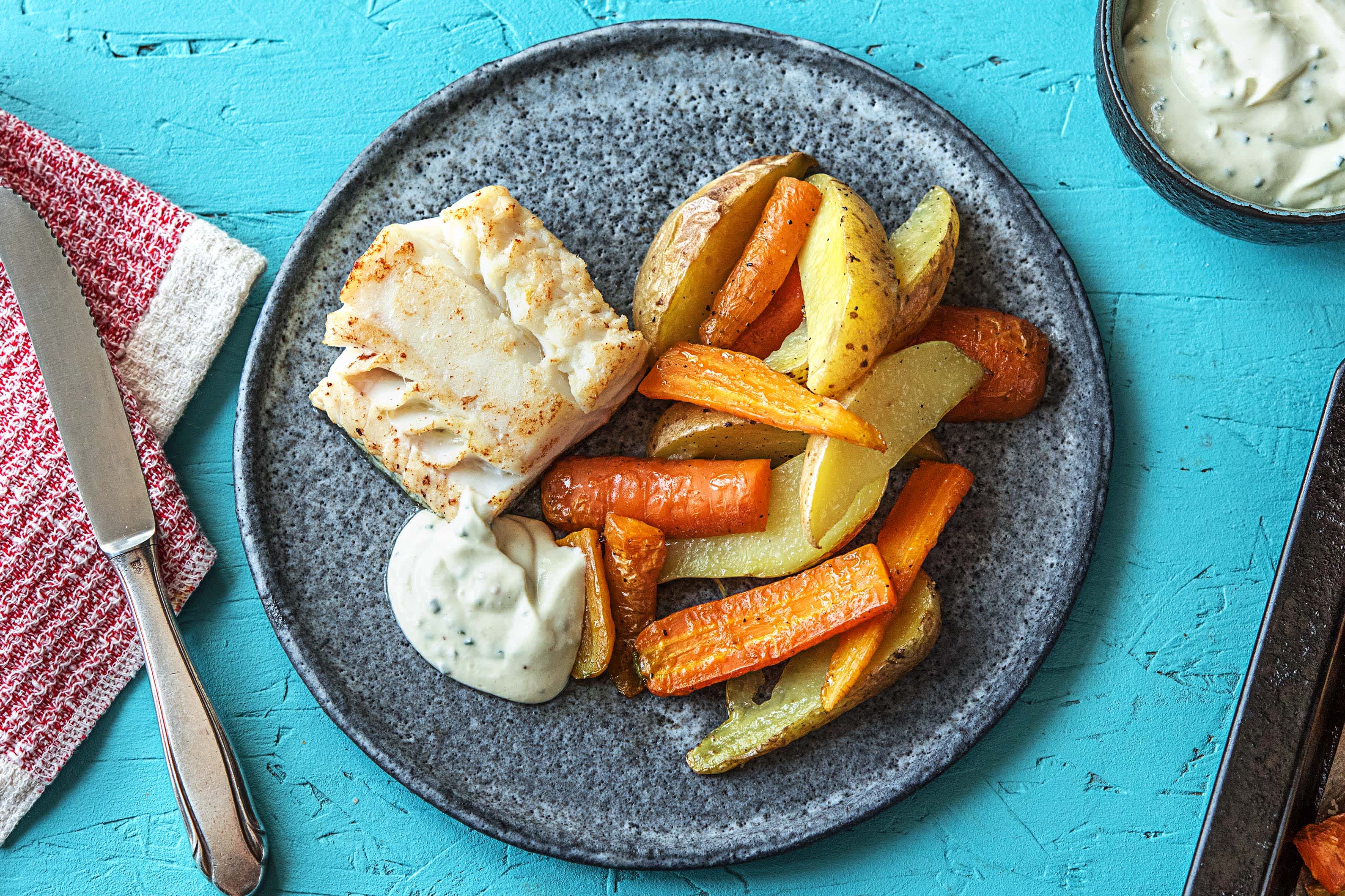 Schelvis met bieslooksaus, bospeen en aardappelen