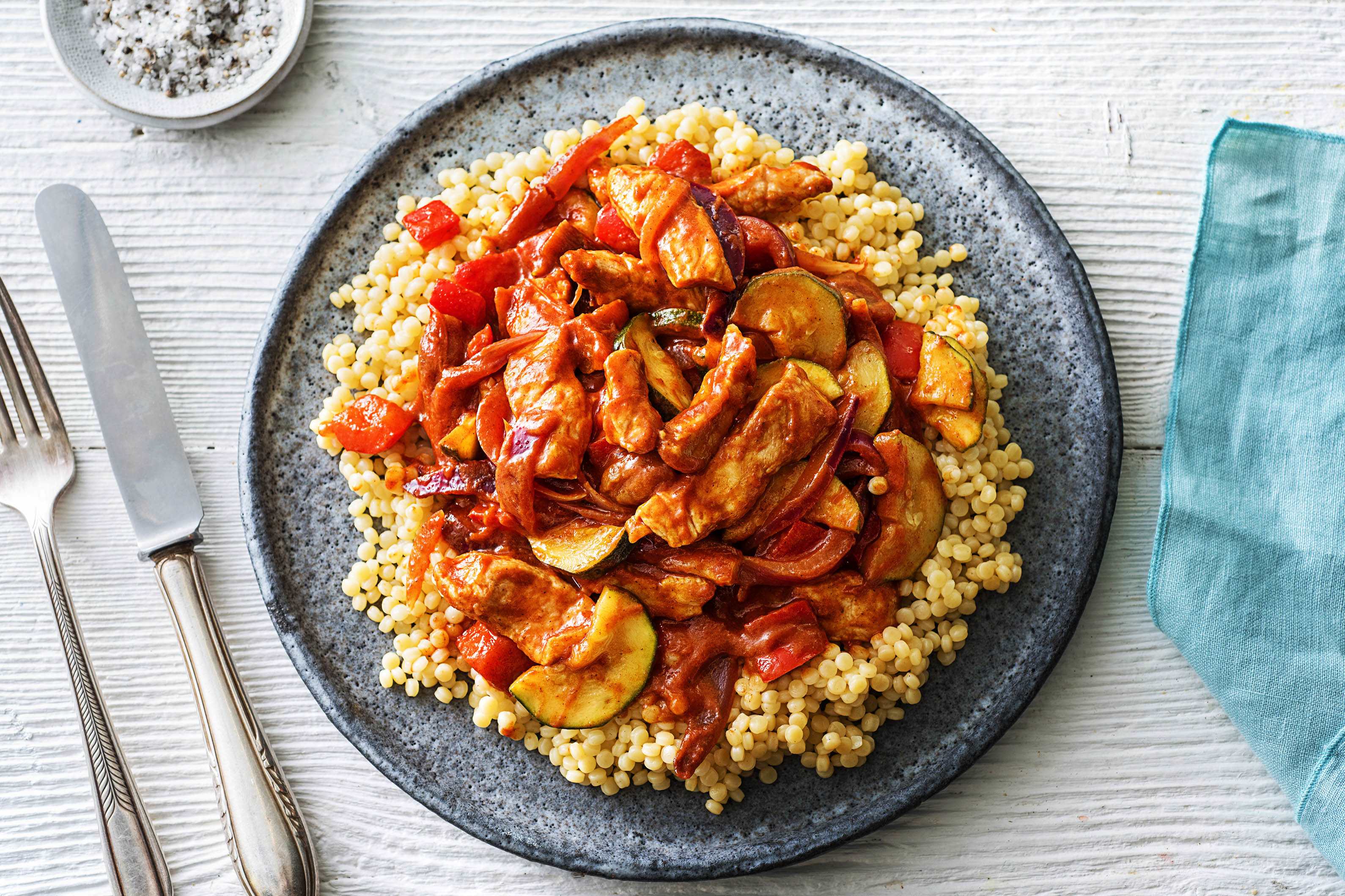 Zoete varkensfiletreepjes met parelcouscous