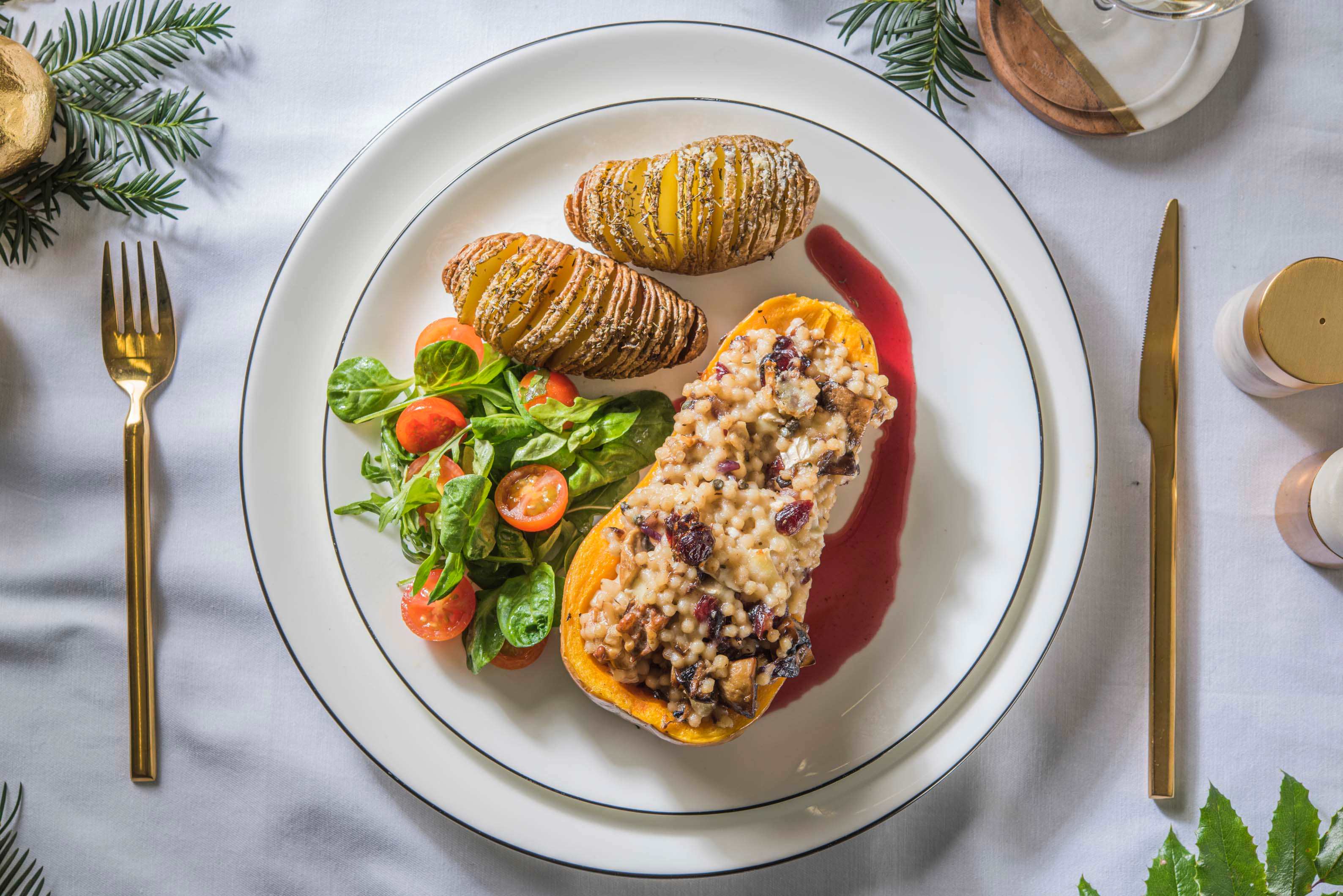 Flespompoen gevuld met parelcouscous, brie en walnoten