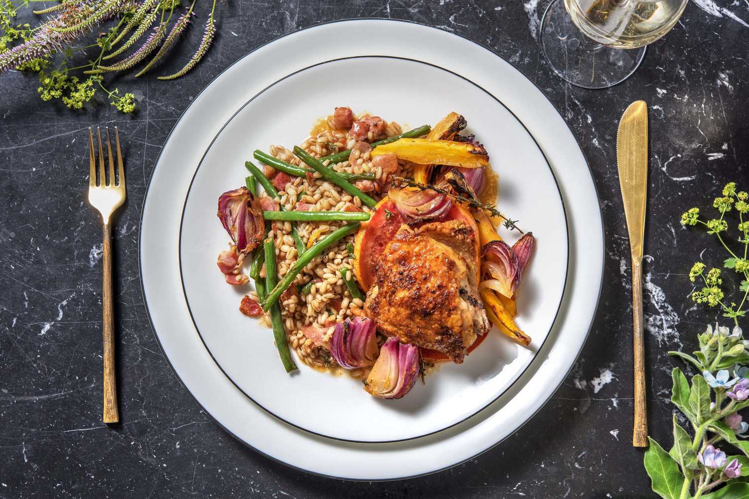 Cuisse de poulet préparée avec une sauce à l'orange sanguine