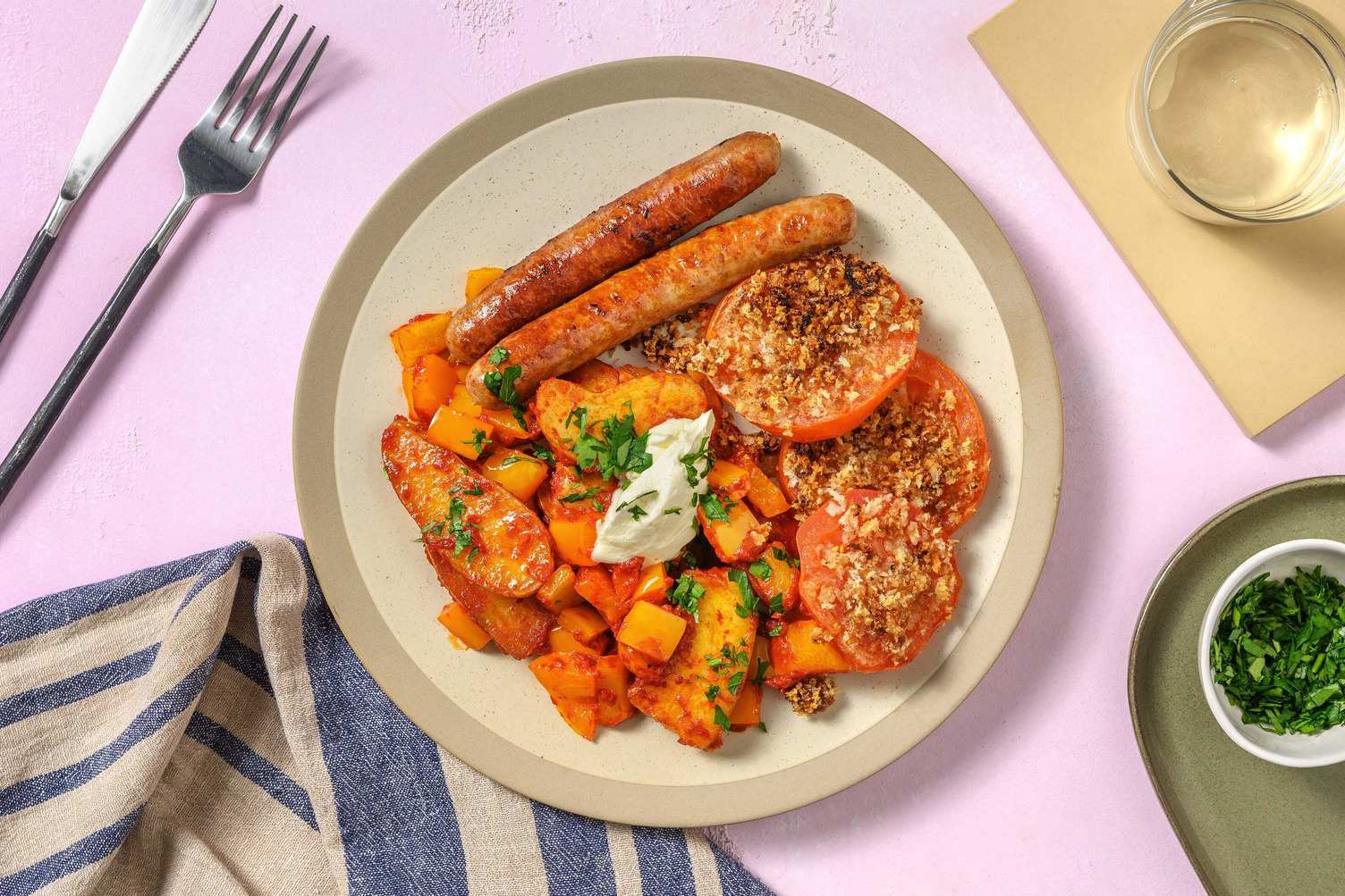 Patatas à la harissa et saucisse de porc