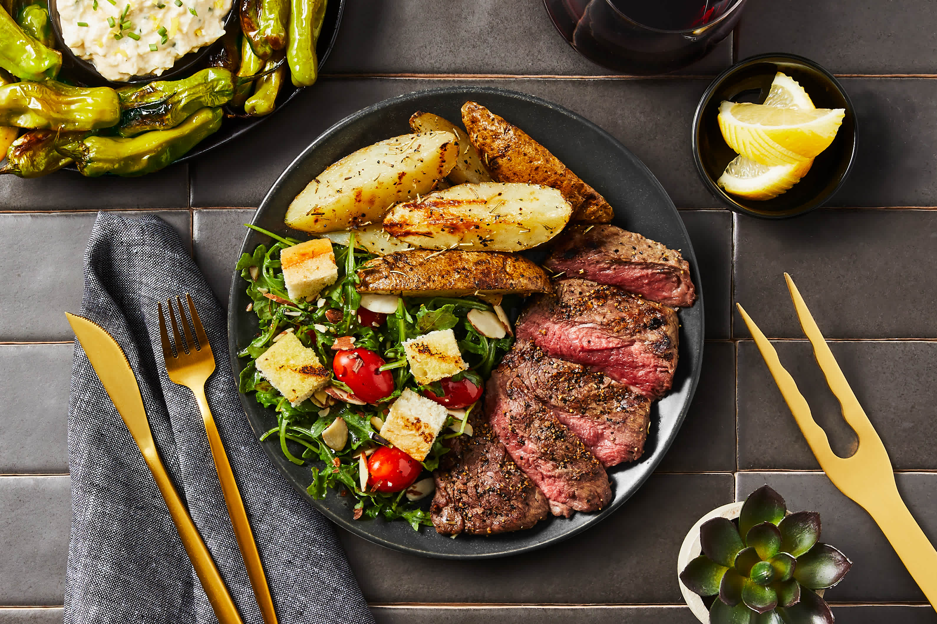 Grilled Garlic Steak & Herby Potatoes