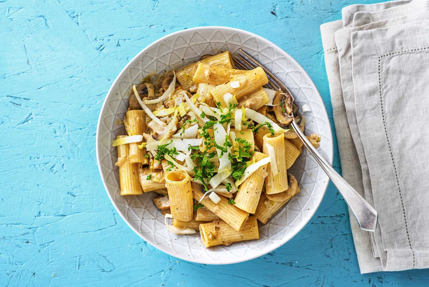 Penne aux endives et sauce crémeuse aux champignons