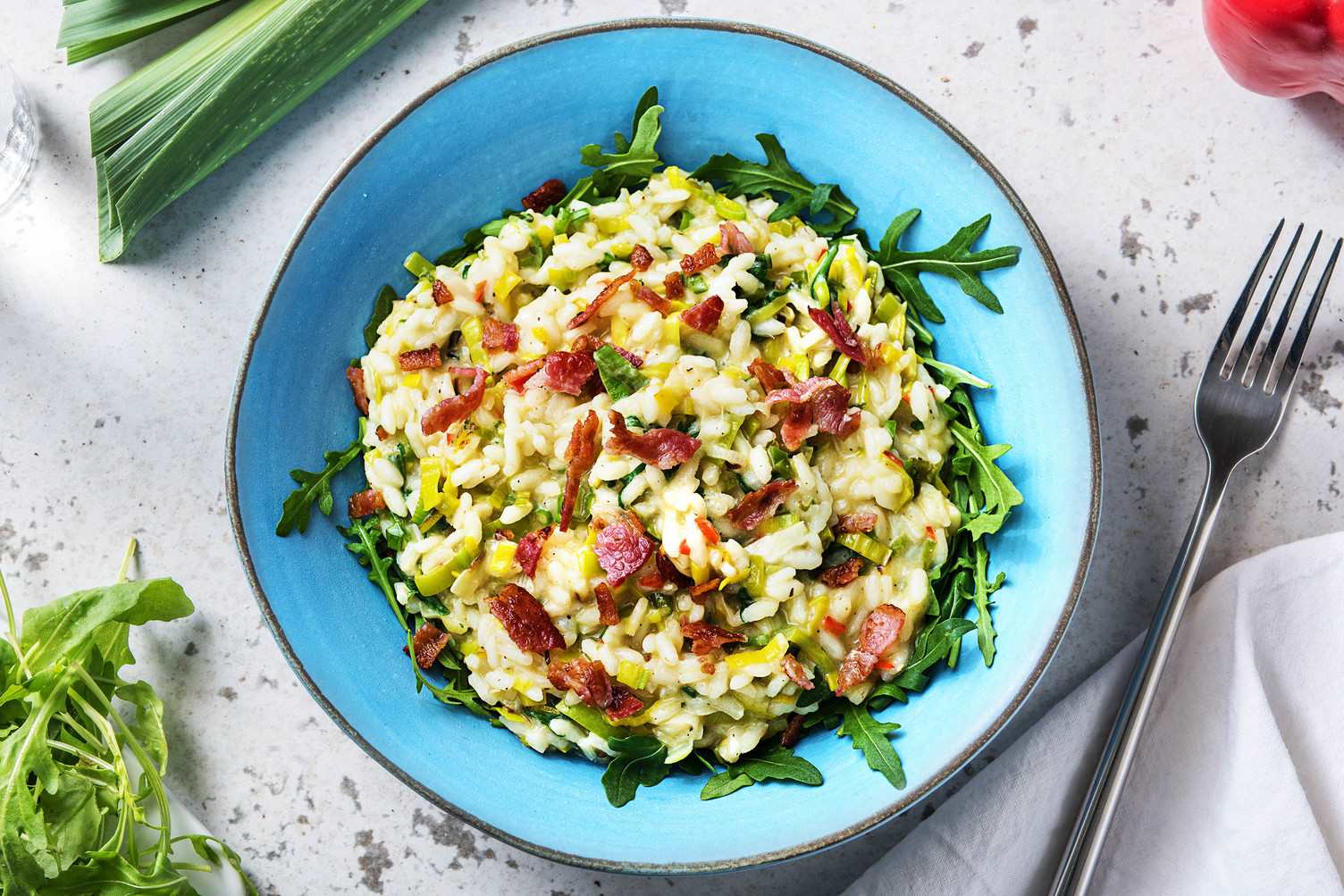 Risotto épicé au lard et au poireau