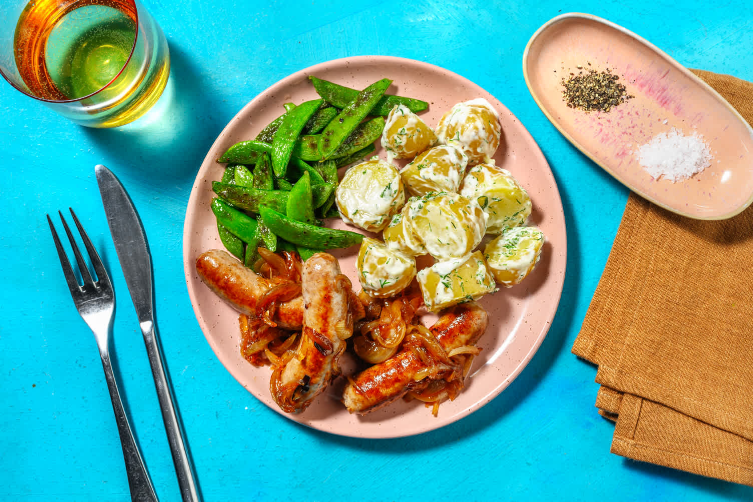 Salchichas encebolladas