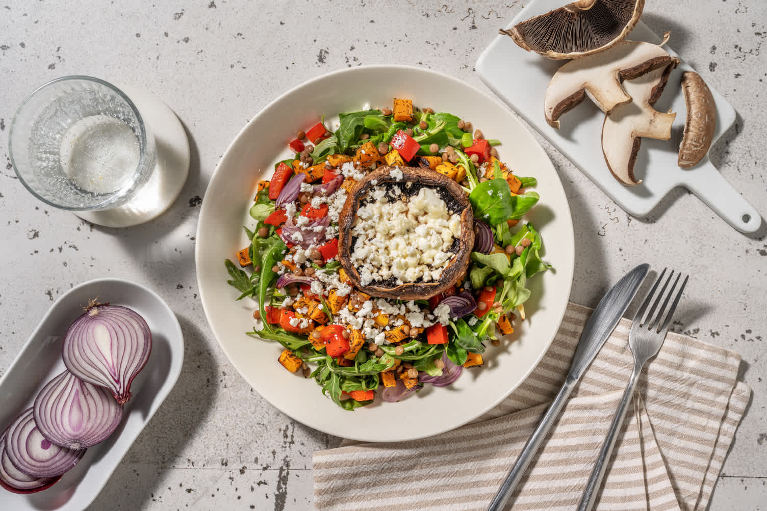 Champignon farci au fromage frais & légumes rôtis
