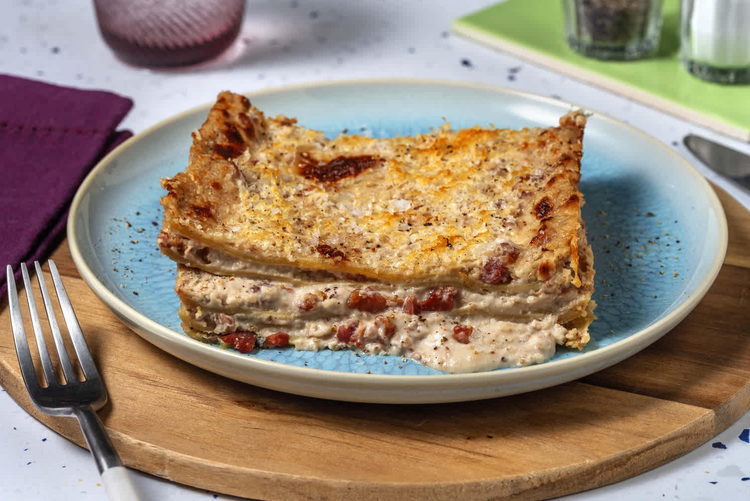 Lasagne in salsa di noci e bacon tostato