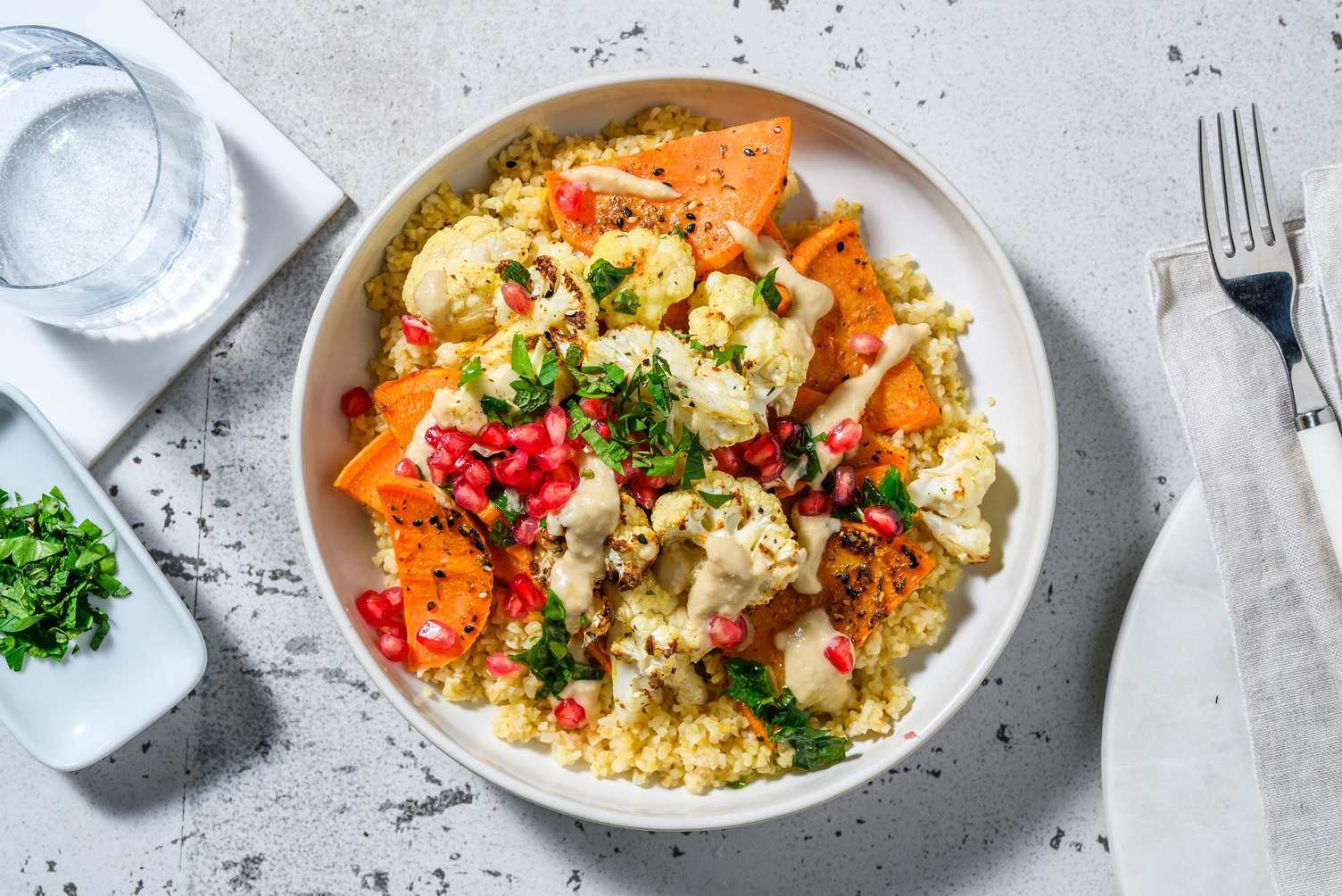 Geroosterde bloemkool en zoete aardappel met bulgur