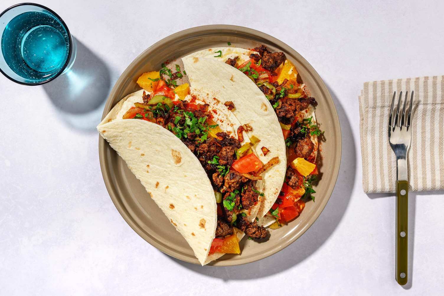 Za'atar wraps met varkensboerengehakt en verse kruiden