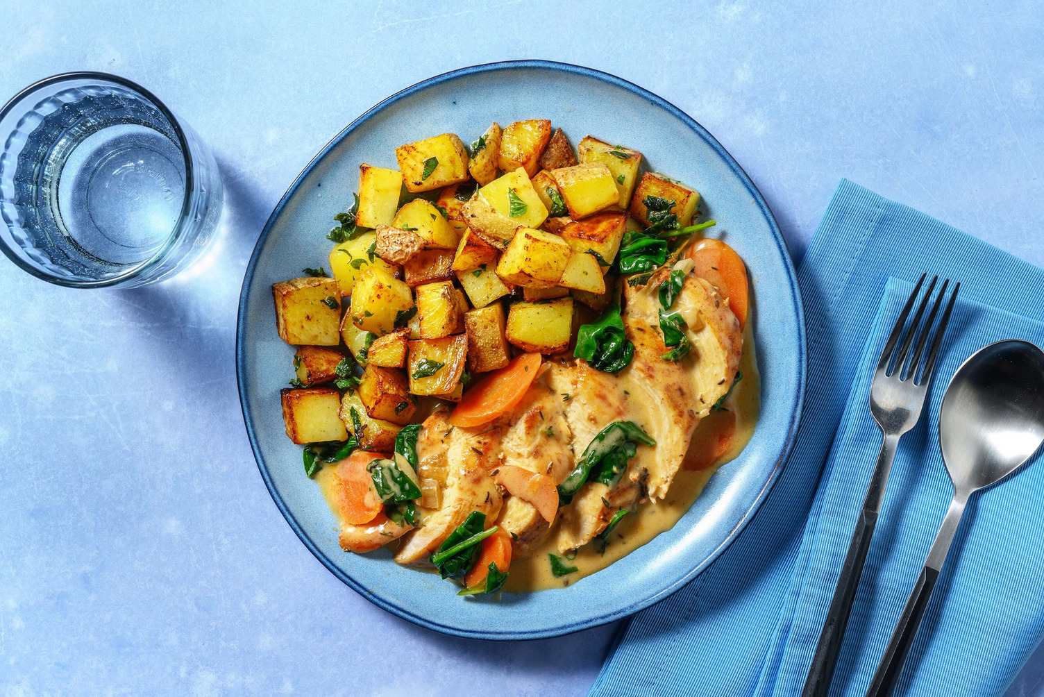 Kipfilet in roomsaus met spinazie en wortel
