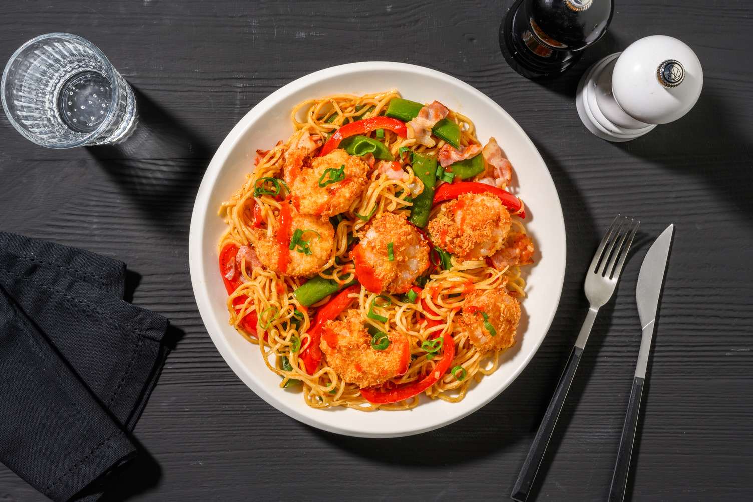 Sauté de nouilles et de crevettes géantes à la noix de coco