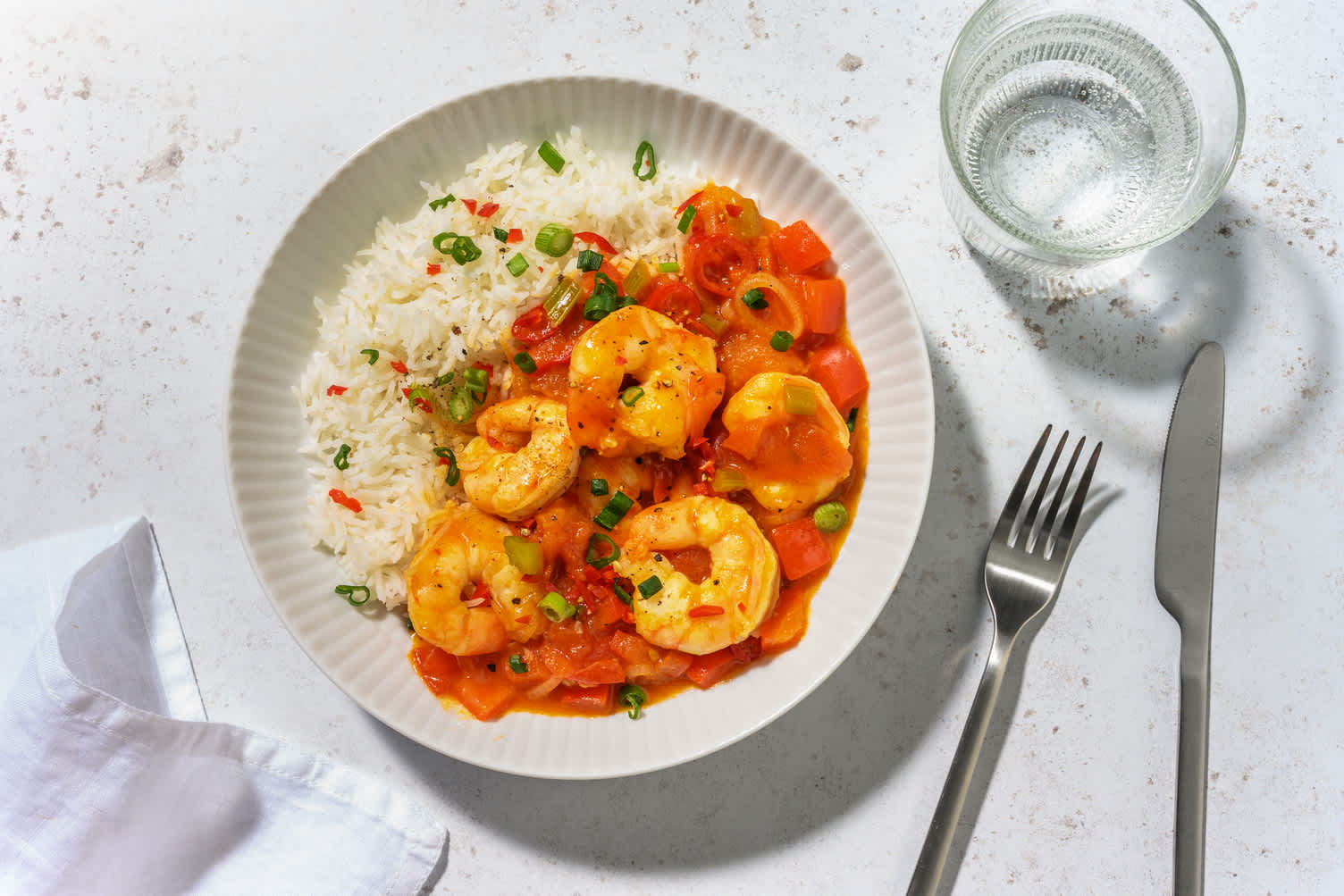 Étouffée di mazzancolle in sugo alla creola
