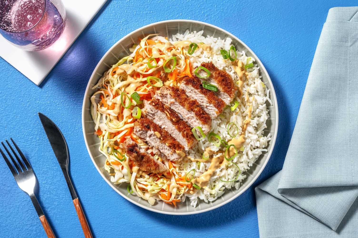 Schnitzel met knoflook-gemberrijst