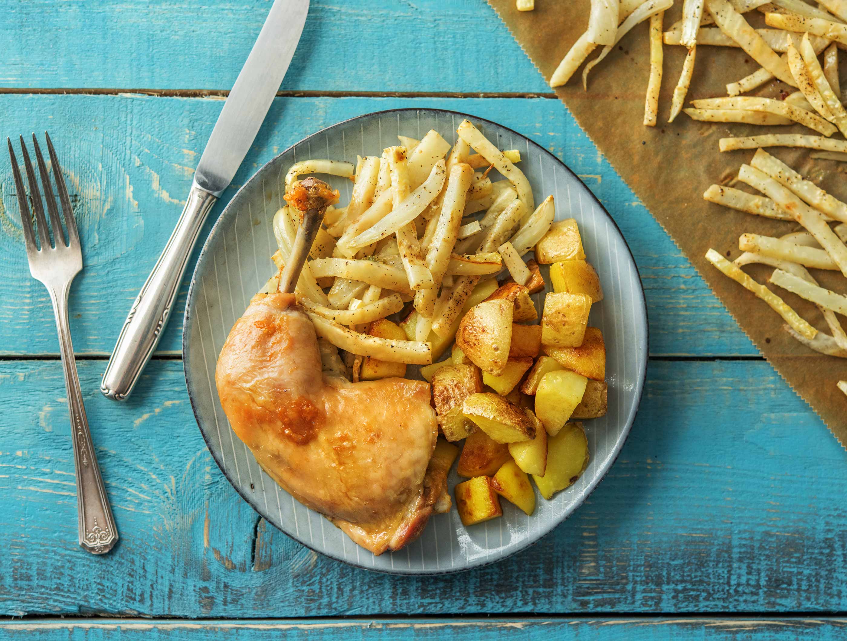 Cuisse de poulet confite, légumes d'hiver et pommes de terres sautées