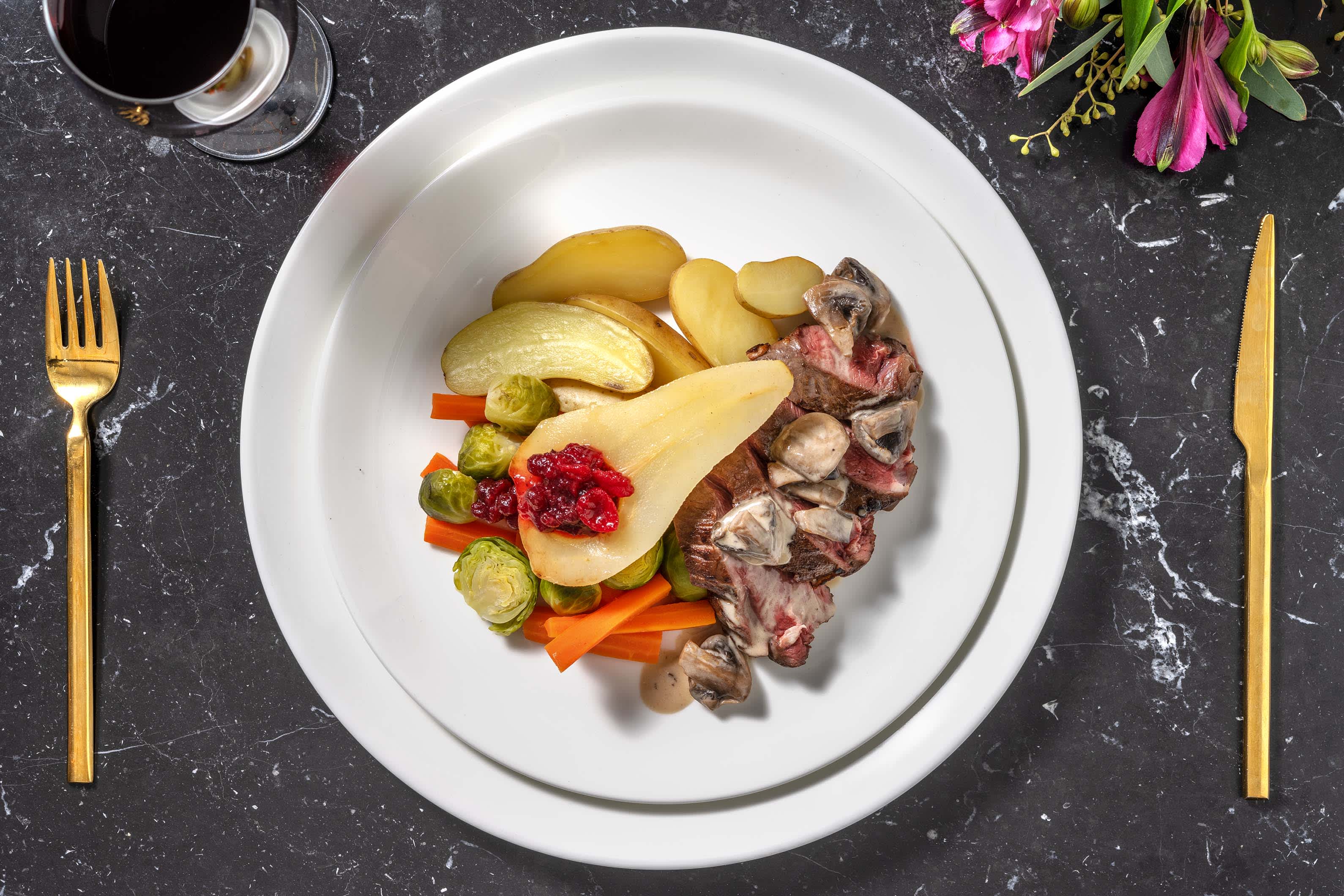 Hirschsteak mit pochierter Birne