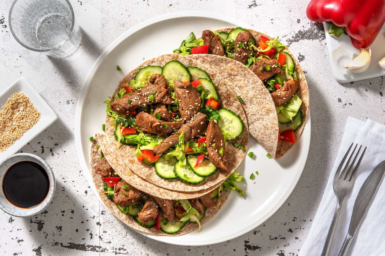 Mini-tortillas, émincés de filet de porc et gomasio