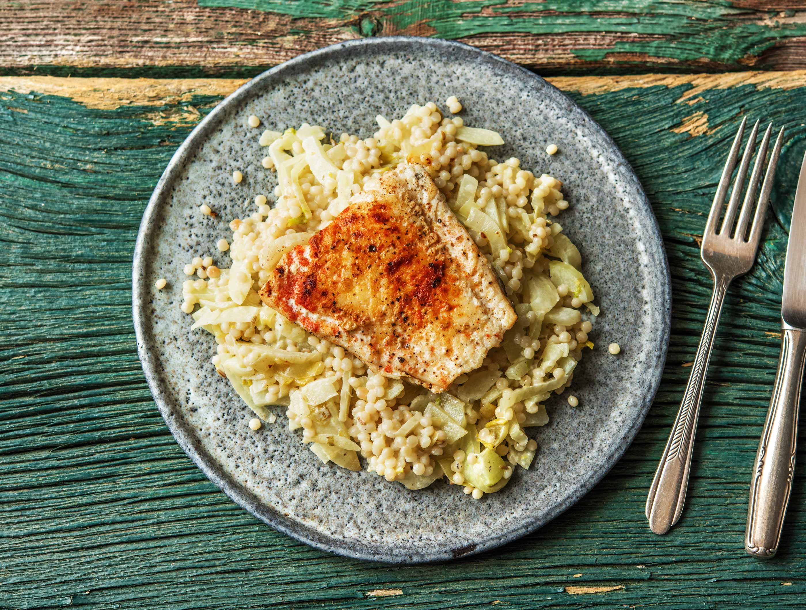Parelcouscous met gekruide heekfilet en venkel