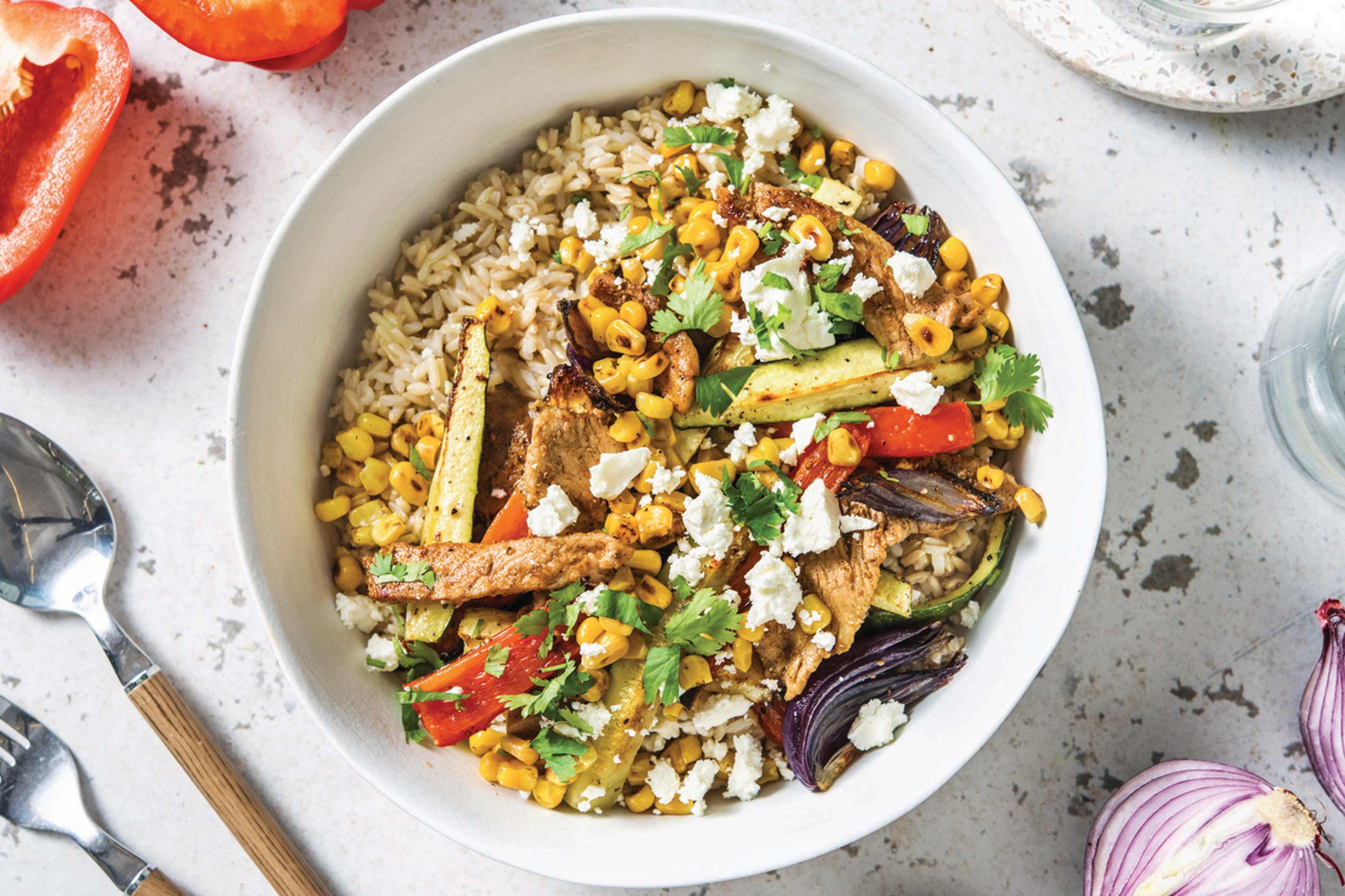Loaded Pork Fajita Bowl with Garlic Brown Rice & Fetta