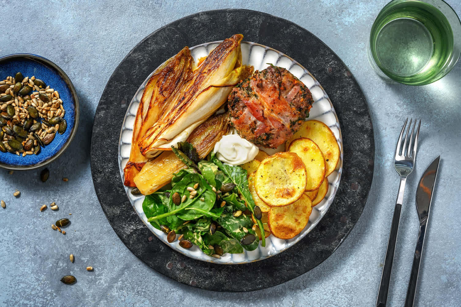 Steak haché ardennais et chicons caramélisés