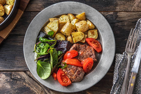 Rindersteak mit gedämpften Tomaten