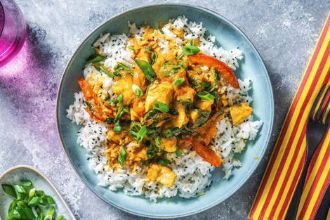 Mildes Fischcurry mit Tomaten und Spinat