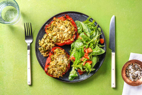 Halve paprika's gevuld met orzo, pecorino en prei