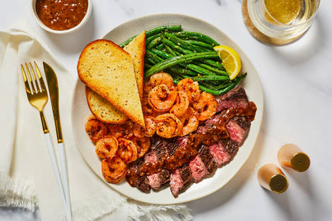 Steak au Poivre & Garlic Herb Shrimp
