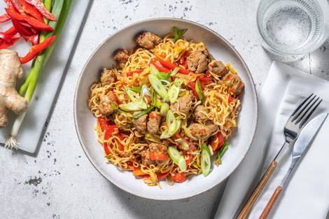 Nouilles sautées et saucisse fermière