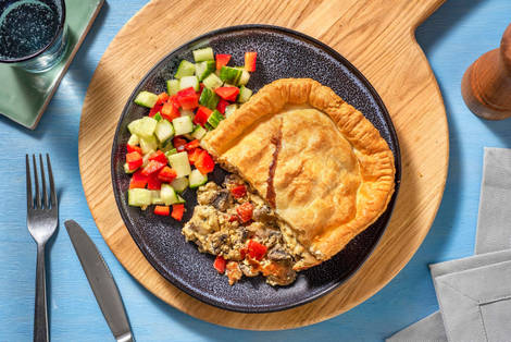 Hartige taart met grano padano en champignons