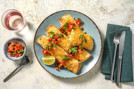 Cheesy enchiladas met chipotle en champignons