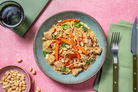 Asiatisk svinekød i cremede nudler