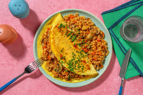 Omurice - omelette ripiena di orzo e funghi