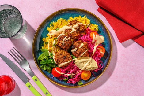 Bols arc-en-ciel de falafels et de poulet