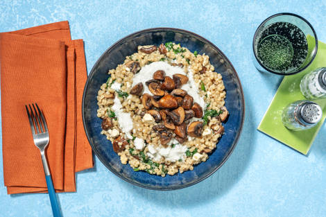 Cuscús perlado con portobellos caramelizados y langostinos
