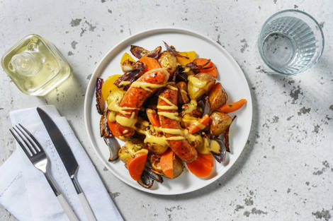 Saucisses de porc en sauce miel-moutarde