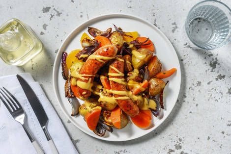 Saucisses de porc nappées d'une sauce au miel-moutarde