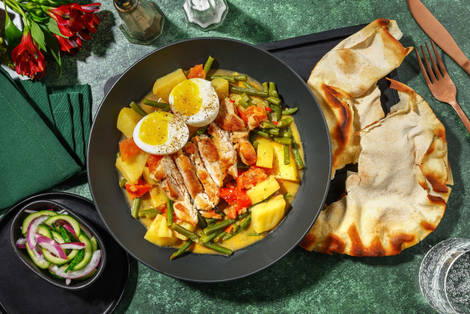 Roti met pikante kippendij en aardappelen