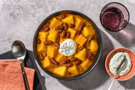 Curry de patata, boniato y judías con langostinos