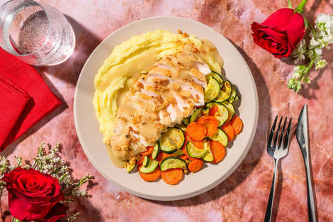 Poulet garni d’échalotes frites