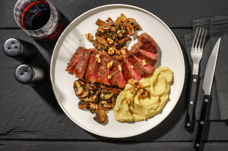 Tagliata di manzo ai funghi e aroma al tartufo