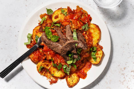 Vegetarische runderstukjes met cheesy patatjes en basilicum