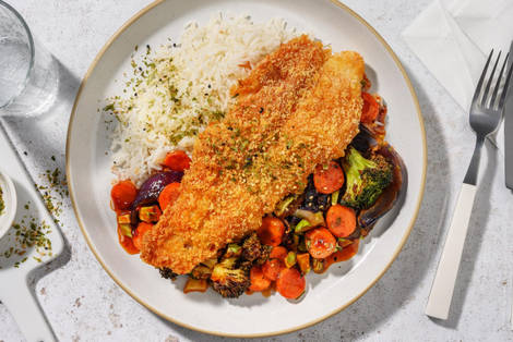 Pangasius pané et légumes laqués