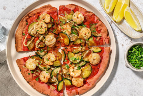 Pain plat aux crevettes et sauce au tahini